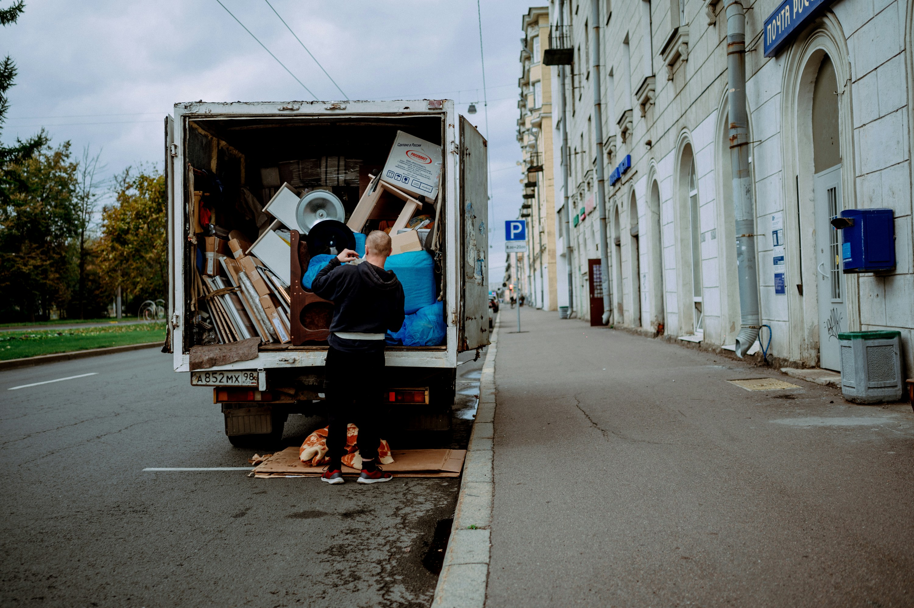 Moving crew unloading a truck in NYC — Queens Move Co. commercial moving